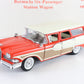 A vintage-style model station wagon toy car in red, cream, and tan, photographed on a plain white background with printed red text above.