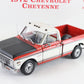A 1972 Chevrolet Cheyenne model truck, likely a diecast scale model, shown from a three-quarter front angle. The truck features a white body WITH red, roof, and bed, and a black hood.