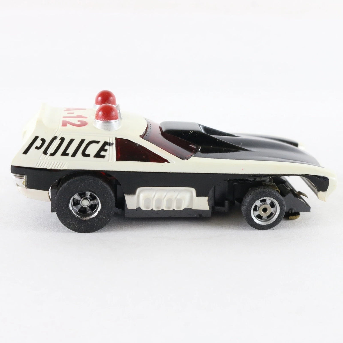 Aurora AFX Chevy Vega A12 Police Black White Slotless HO Slot Car