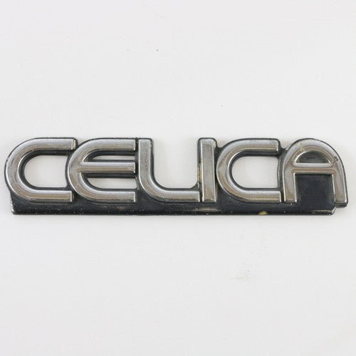  1970s or 80s Toyota Celica Silver & Black Plastic Emblem Badge 5.75"