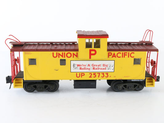 Atlas O Union Pacific UP 25733 Illuminated Red & Yellow Caboose Car – Atlas O scale Union Pacific illuminated red and yellow caboose train car.