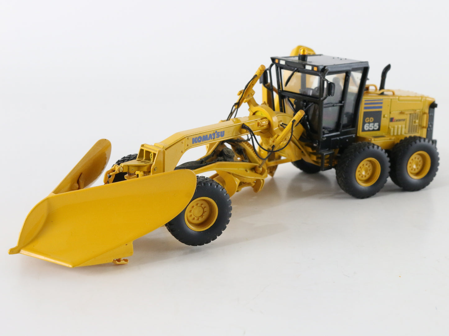 Komatsu GD655 Motor Grader with Plow First Gear Metal Model 1:50