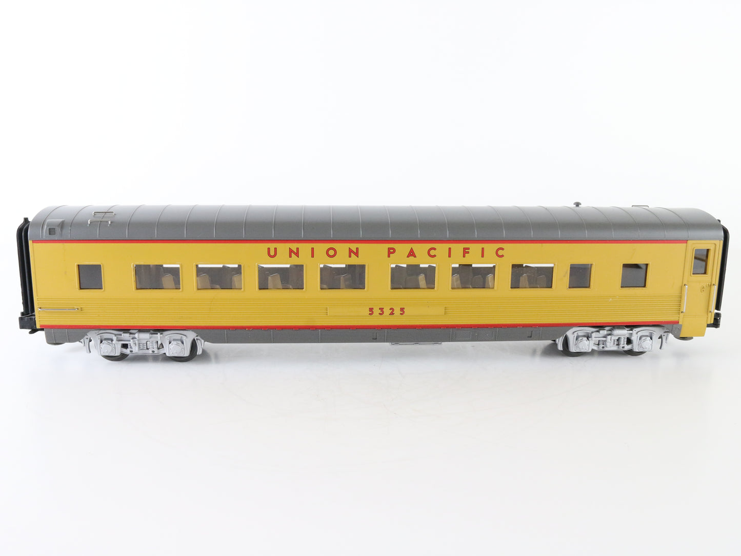MTH O Union Pacific UP 5325 Illuminated Gray & Yellow Passenger Car 3 Rail – MTH O scale Union Pacific illuminated gray and yellow passenger car for train setups.