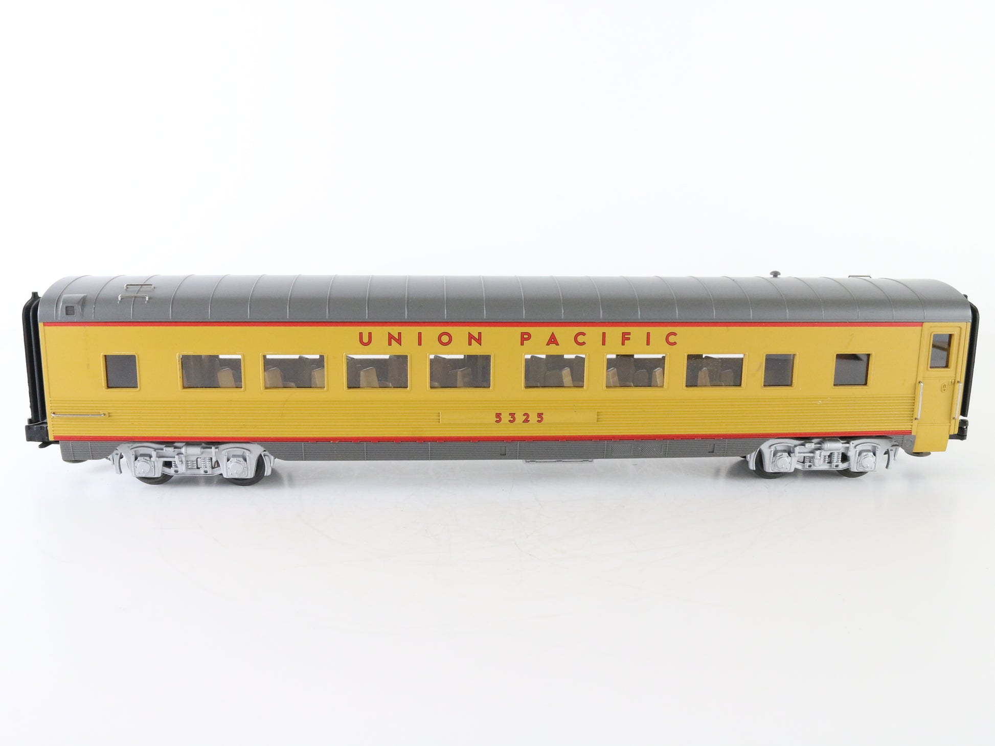 MTH O Union Pacific UP 5325 Illuminated Gray & Yellow Passenger Car 3 Rail – MTH O scale Union Pacific illuminated gray and yellow passenger car for train setups.