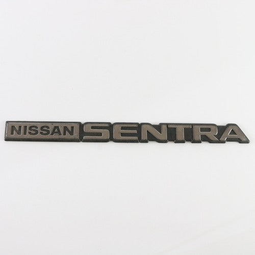 Nissan Sentra North American Specification Rear Emblem 10 ca. 1980s