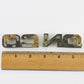Vintage Ford Bronco Silver Plastic Nameplate Emblem Badge FOR PARTS INCOMPLETE