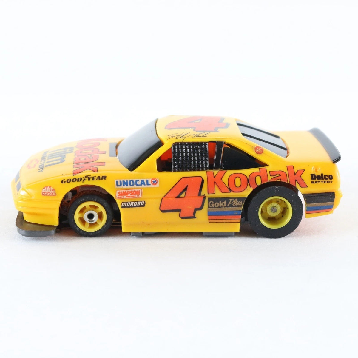 Tyco TCR Chevrolet Lumina #4 Kodak Yellow Red Slotless HO Slot Car