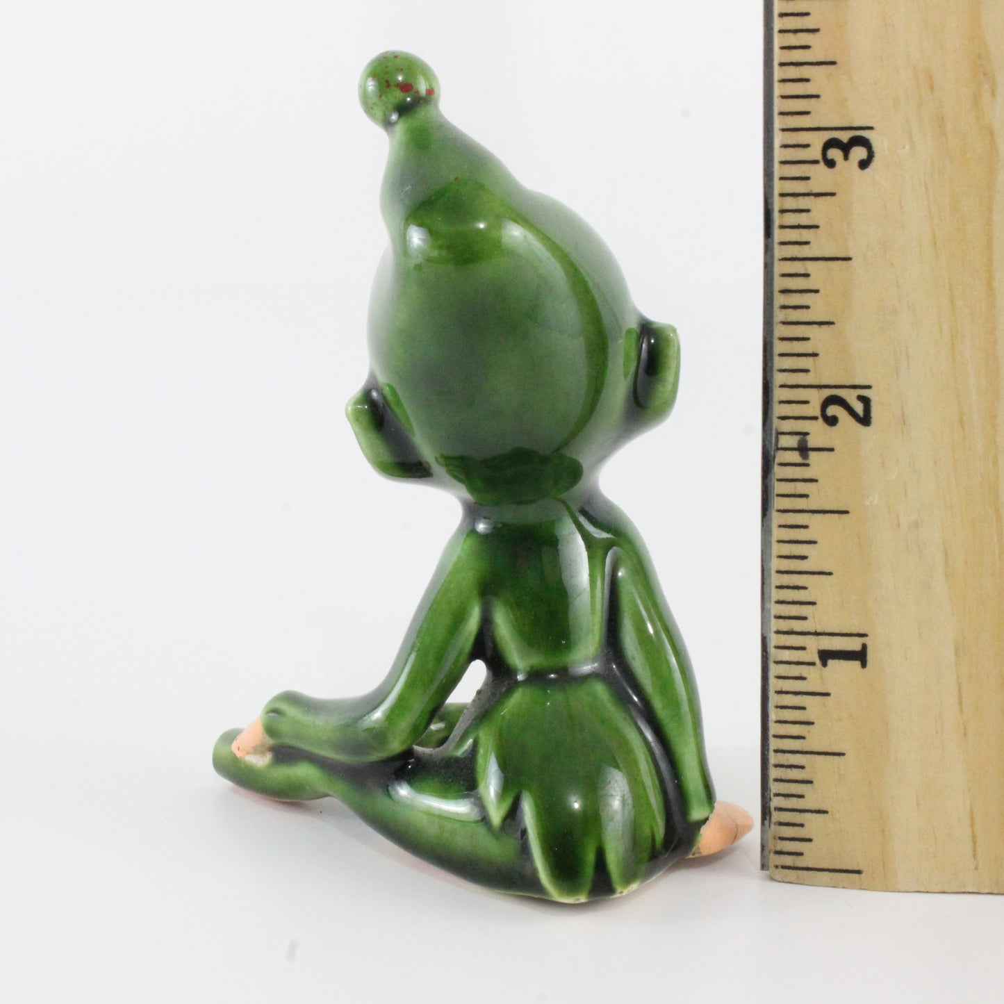 Vintage Ceramic Pixie In Green Elf Suit W/ Hat Sitting Cross Leg Japan 3.25 In