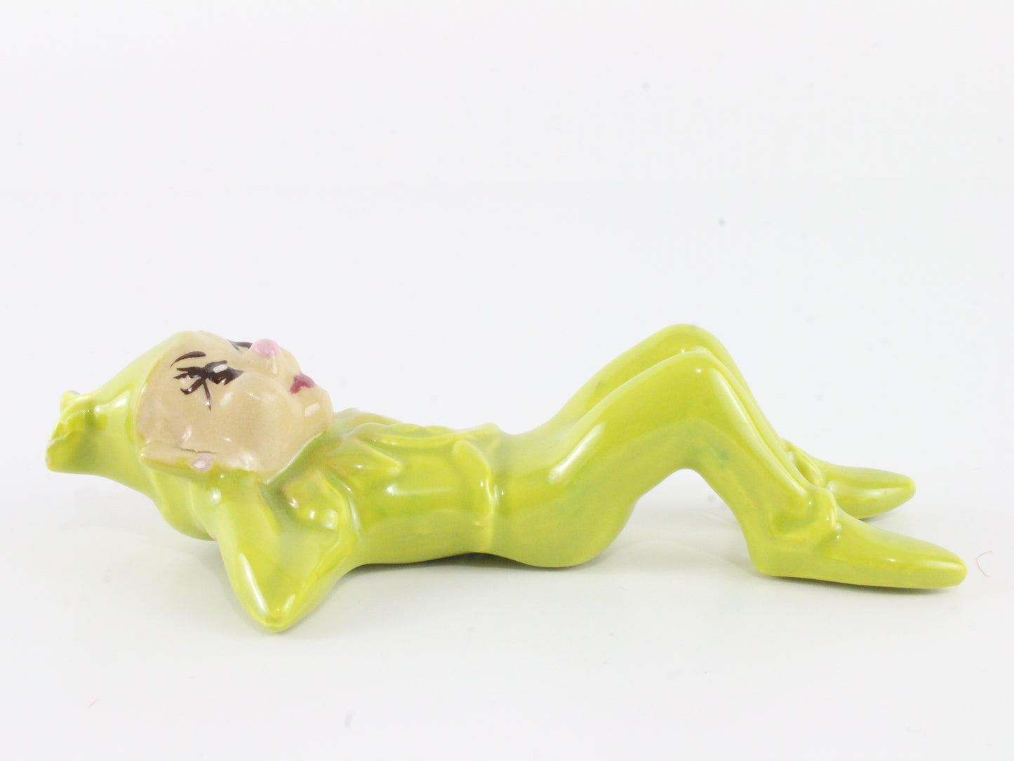 Vintage Pixie Reclining In Green Suit W/ Hat Ceramic 5.5 In