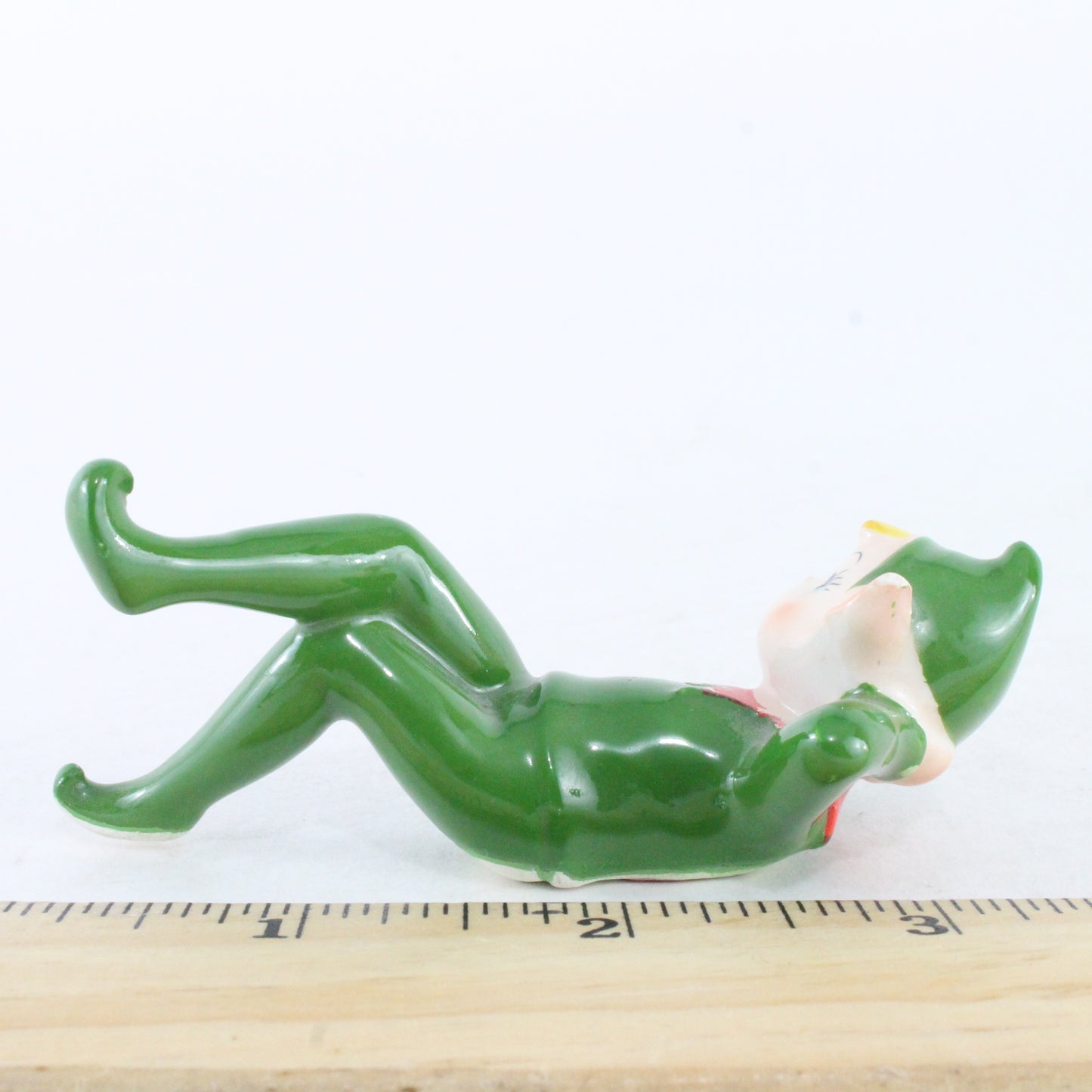 Vintage Ceramic Pixie Elf Reclining In Green W/ Green Hat Made In Japan 3.5 Inch