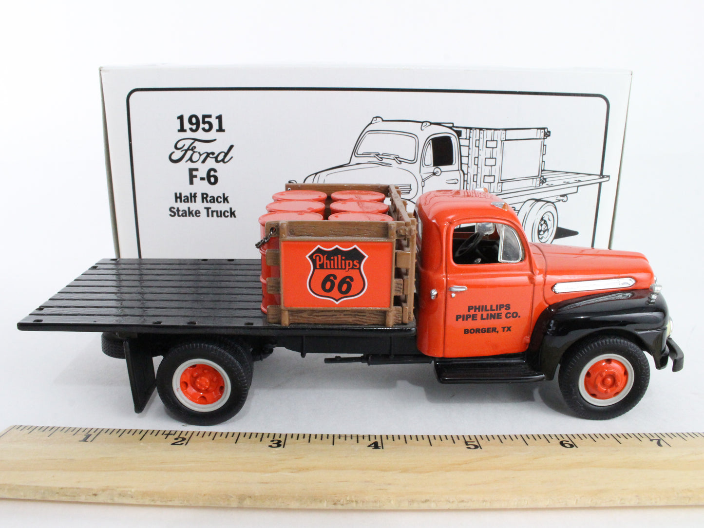 1951 Ford F-6 Half Rack Stake Truck Phillips 66 First Gear 1:34 Model 19-1427